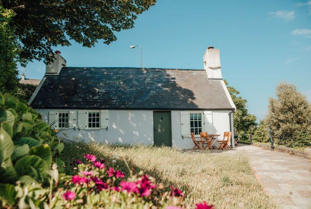 Fishermans Cottage Exterior with Flowers in foreground