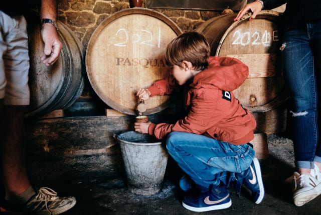 boy opens cask of cider