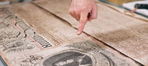 Jersey Archive finger points to important docuement