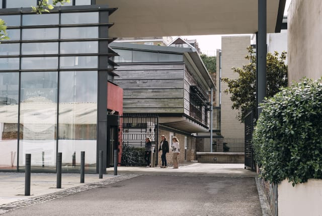 Jersey Archive view of entrance to archive and three people at entrance