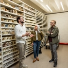 People take a tour of an archive facility