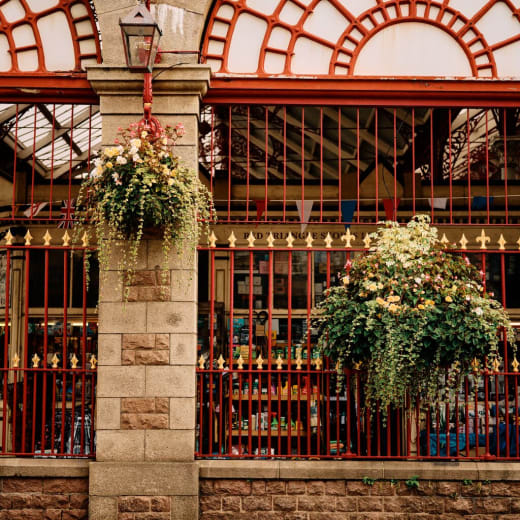 Red iron arches and railings