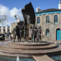 A statue of people celebrating