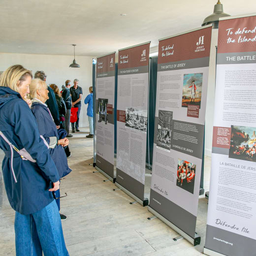 People read exhibition panels