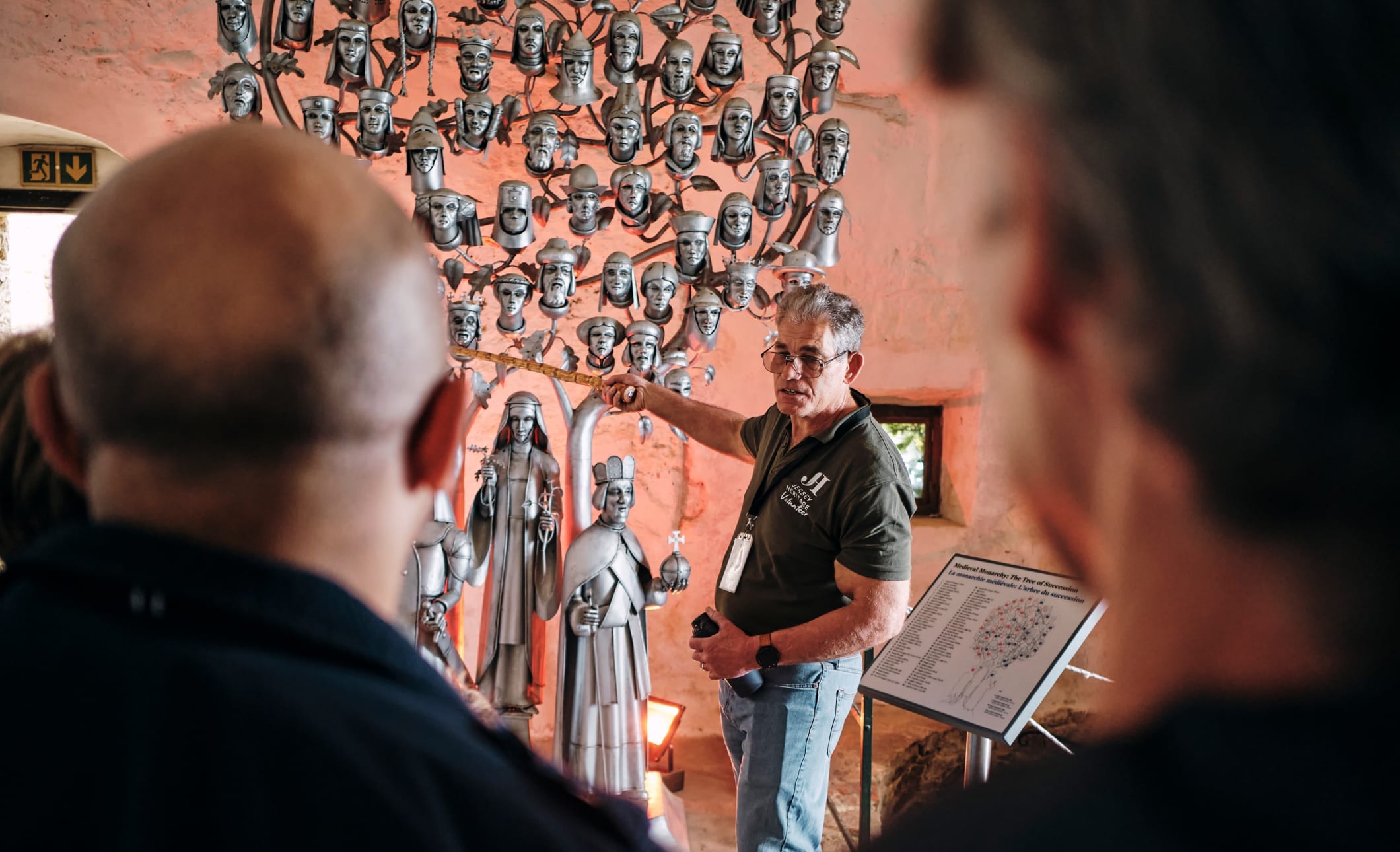 Mont Orgueil Castle volunteer shows off Tree of Succession exhibit
