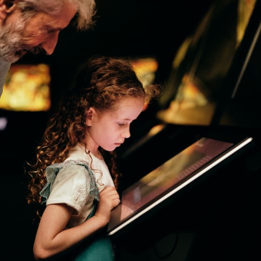 Occupation Tapestry Gallery young girl with touch screen with grandad