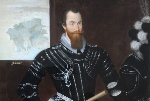 Portrait of a man in armour with a sword
