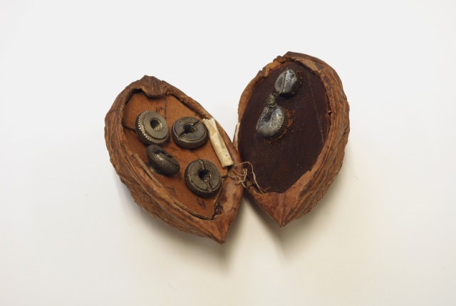 A radio hidden inside a walnut